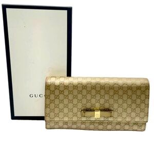Gucci GG Matellise  Gold Clutch with Iconic Design chic luxury handmade MINT